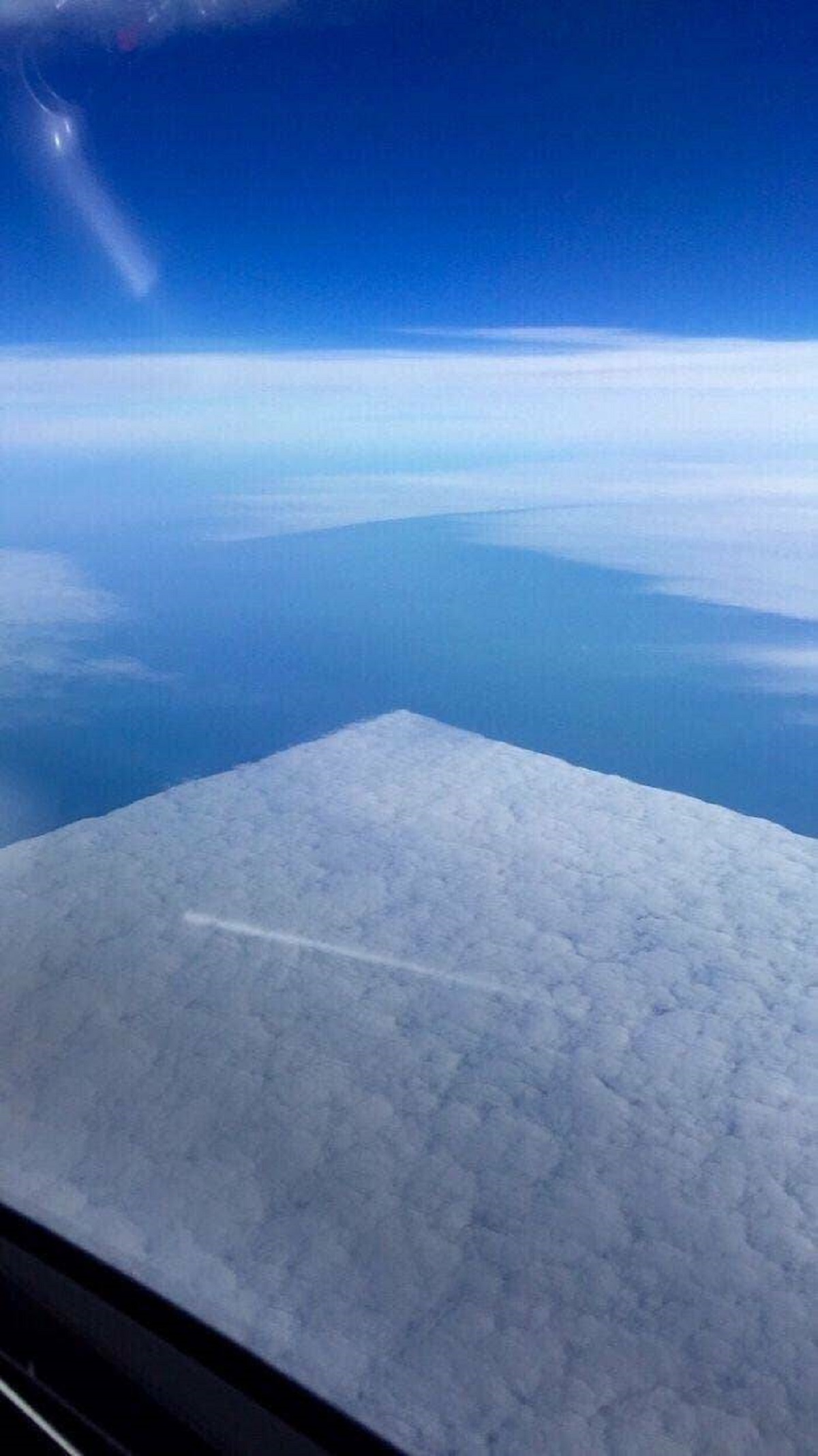 square clouds airplane