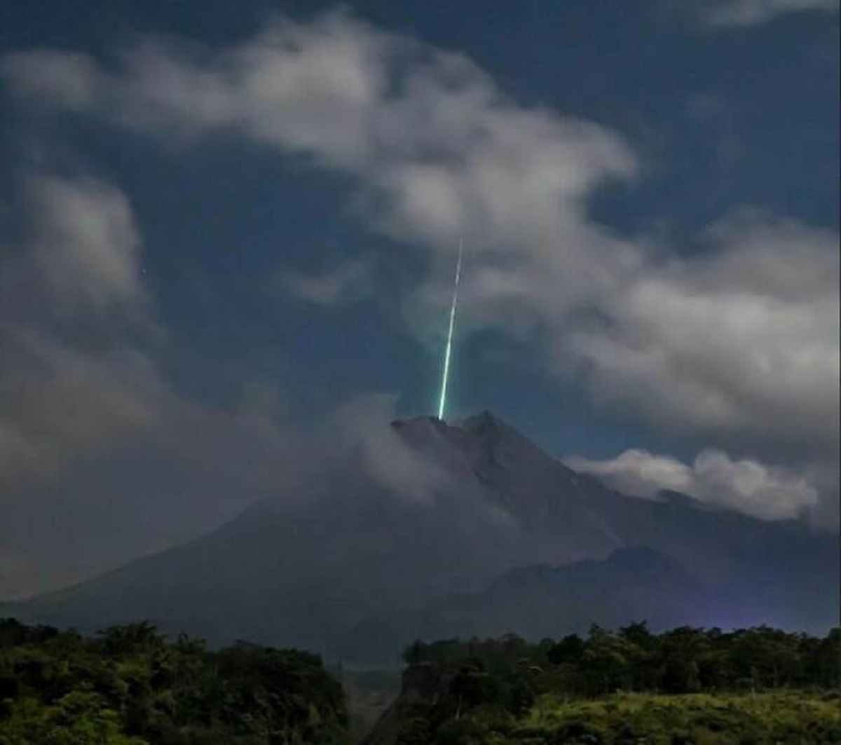 "A Meteor Falling Into The Most Active Volcano In Indonesia, Mount Merapi"