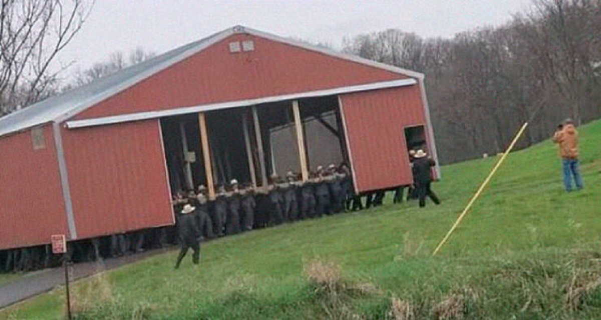 "Amish Community Moving A Barn"