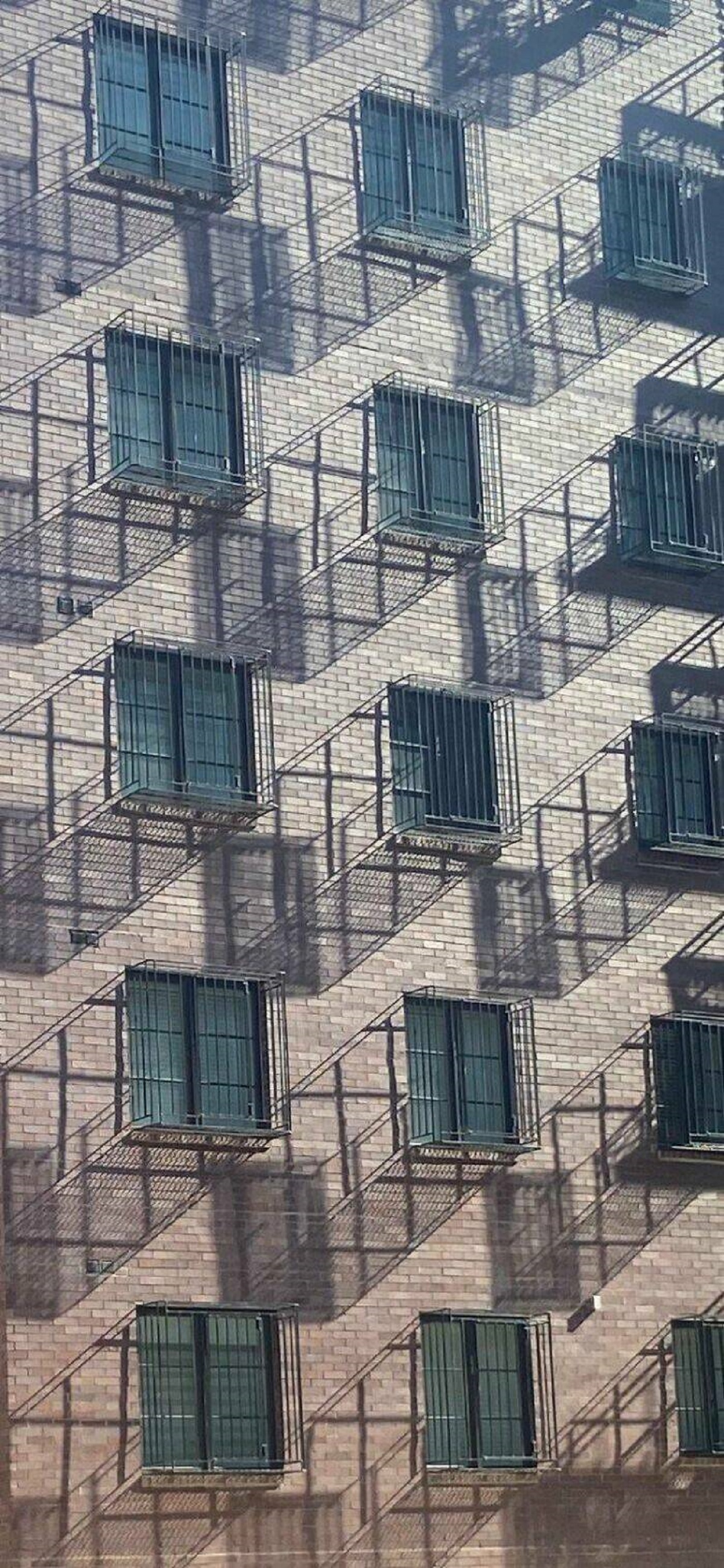 "The Shadows From These Window Cages Create A 3D Effect"