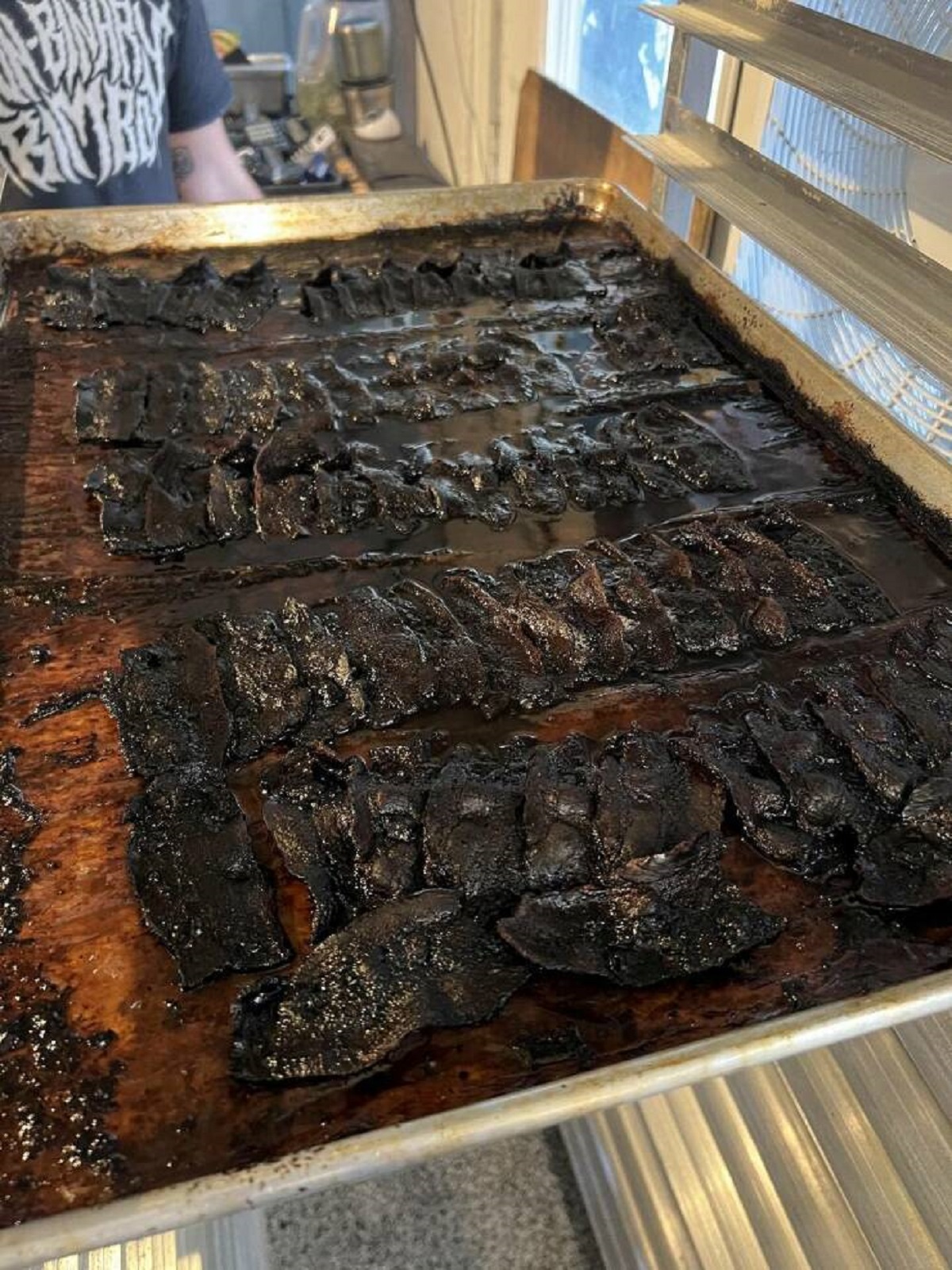 "Bacon forgotten in oven at work"