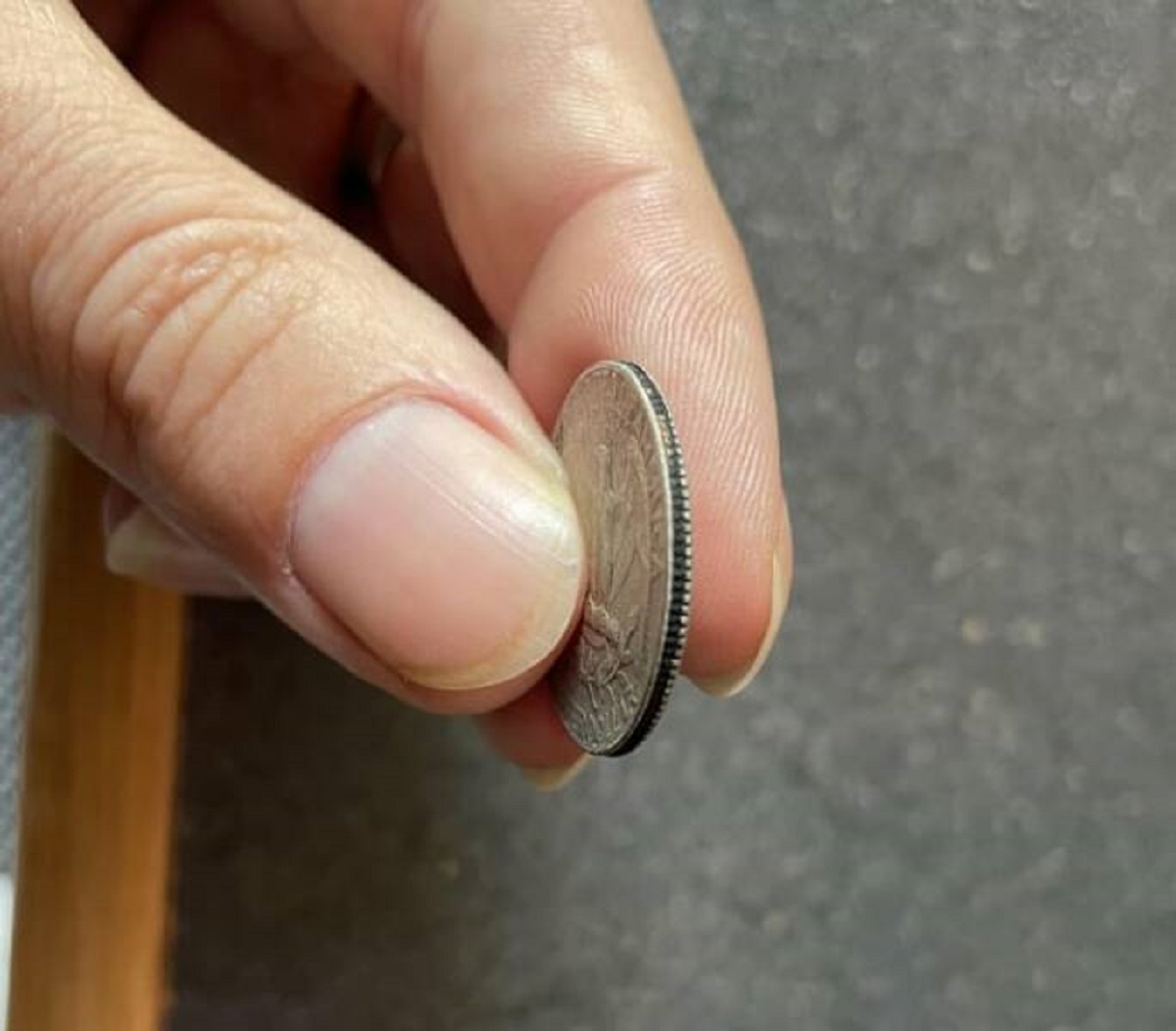 "I received a counterfeit quarter in my change today"