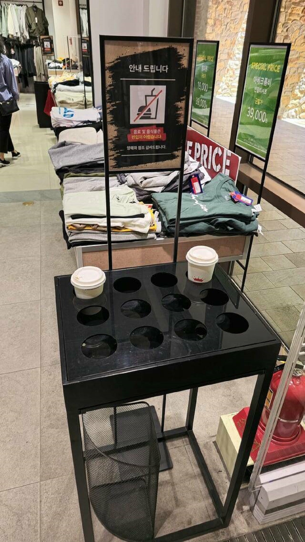 "Some stores in Korea have a spot to leave your coffee so you can browse without carrying it around"