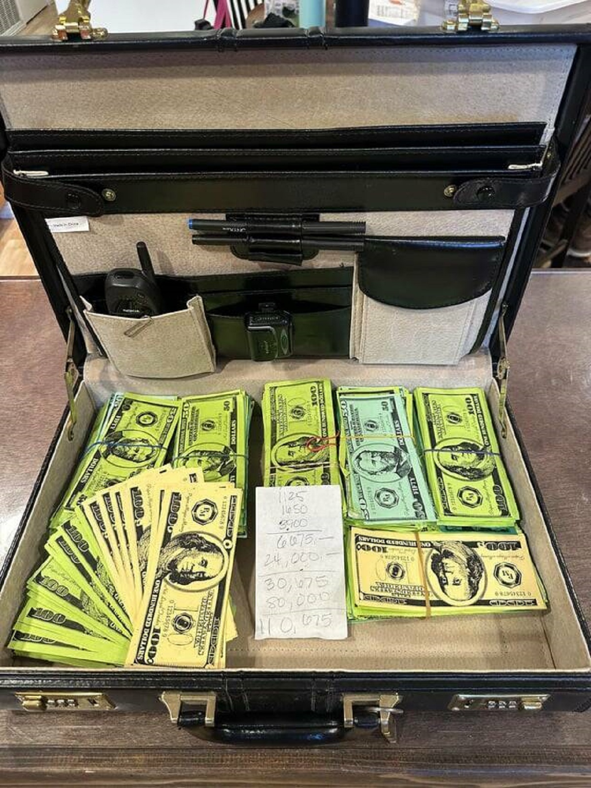 "My briefcase containing $110,675 in “class cash” from back in 6th grade…21 years ago…"