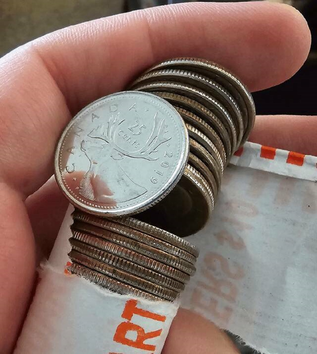 "My roll of US quarters from the bank contained a Canadian quarter"