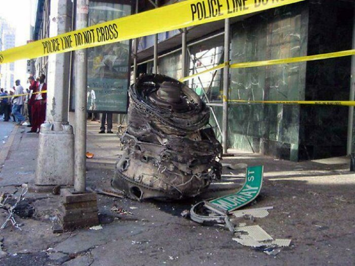 A Chunk Of Debris, Likely From One Of The Crashed Airliners, Lies On The Corner Of Murray Street In Lower Manhattan Near The World Trade Center In New York On Sept. 11, 2001