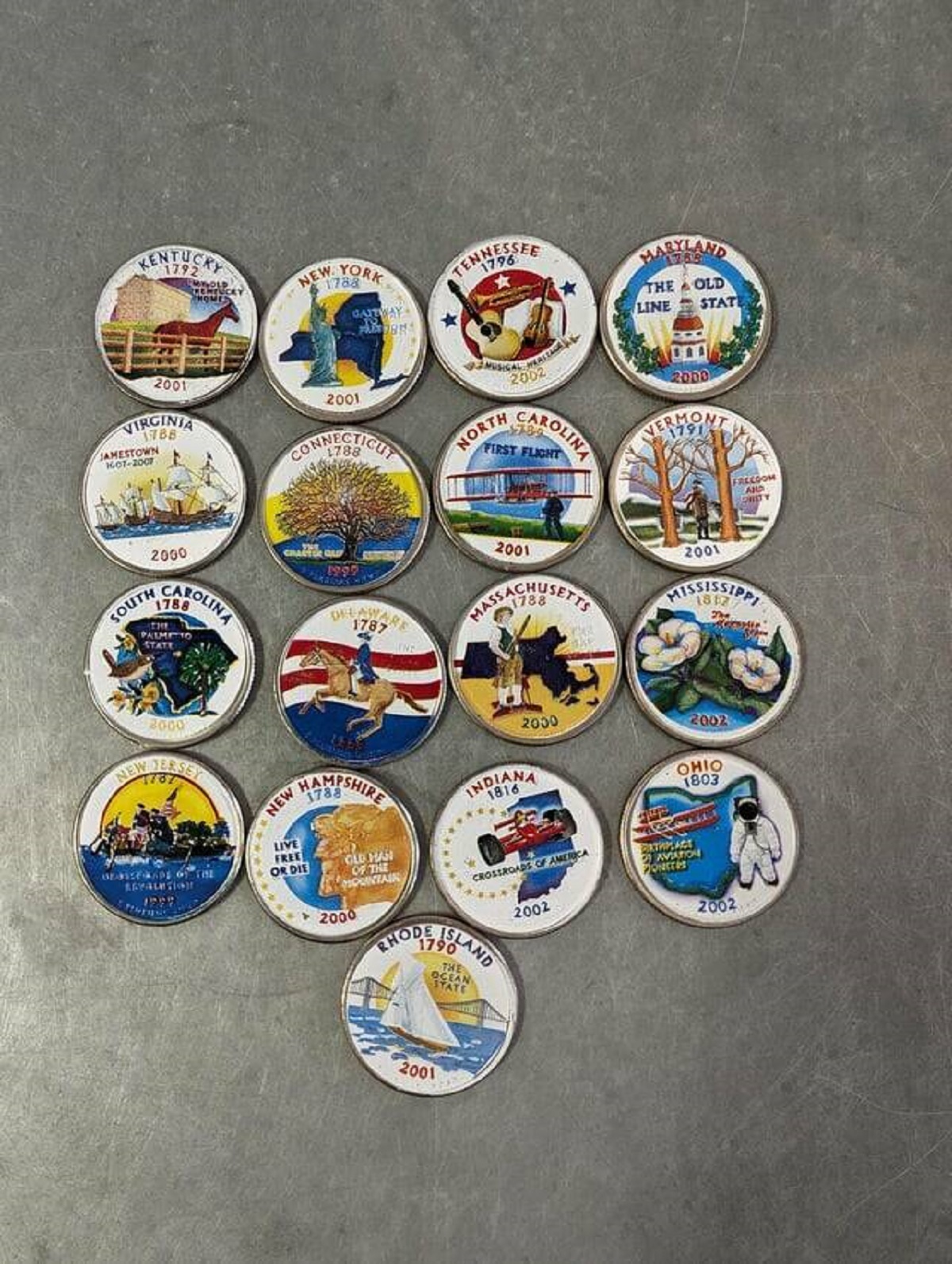 "Someone paid with these colorized state quarters at the store"