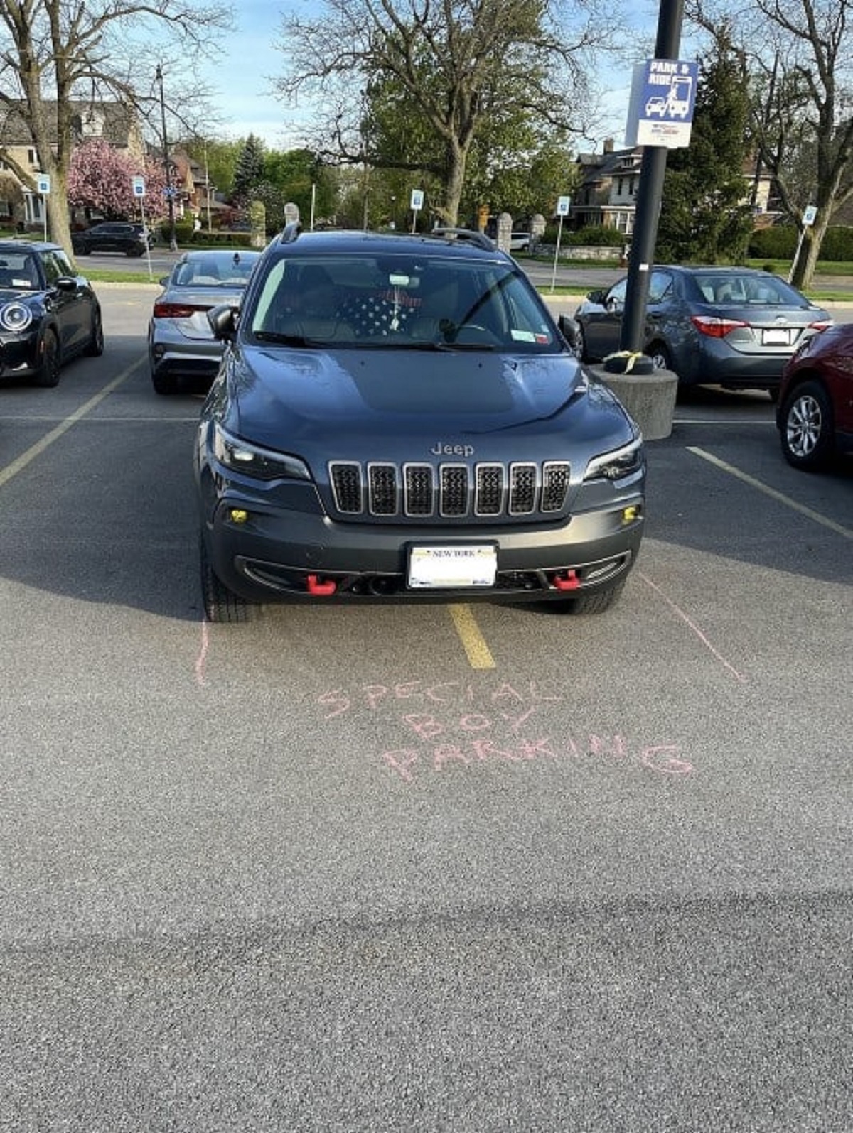 This car parks like this every day. Still parked there after the chalked message too.