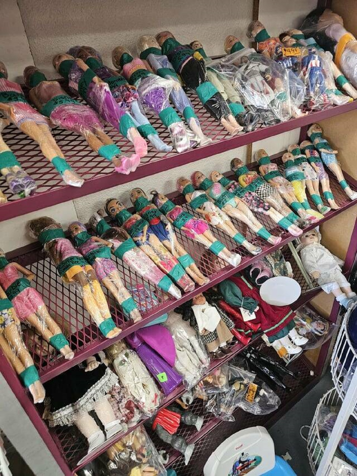 "Local thrift store has all its dolls tied up"