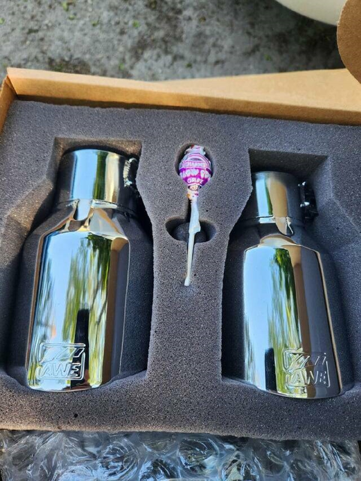 "My exhaust tips came with a lollipop with its own dedicated slot in the packaging"