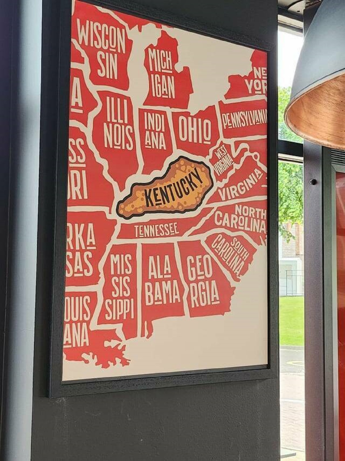 "This map in a KFC in the UK has no trace of Florida"