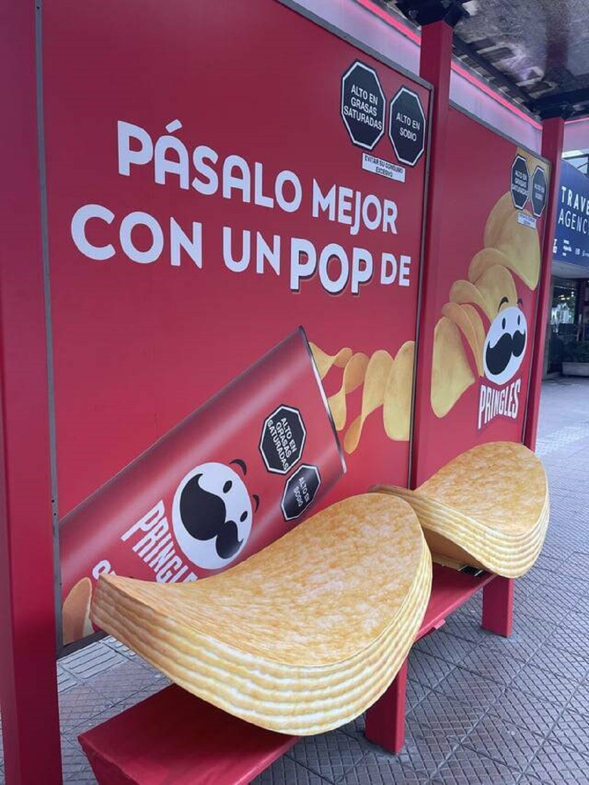 "Pringle shaped seats at a bus stop in Lima"