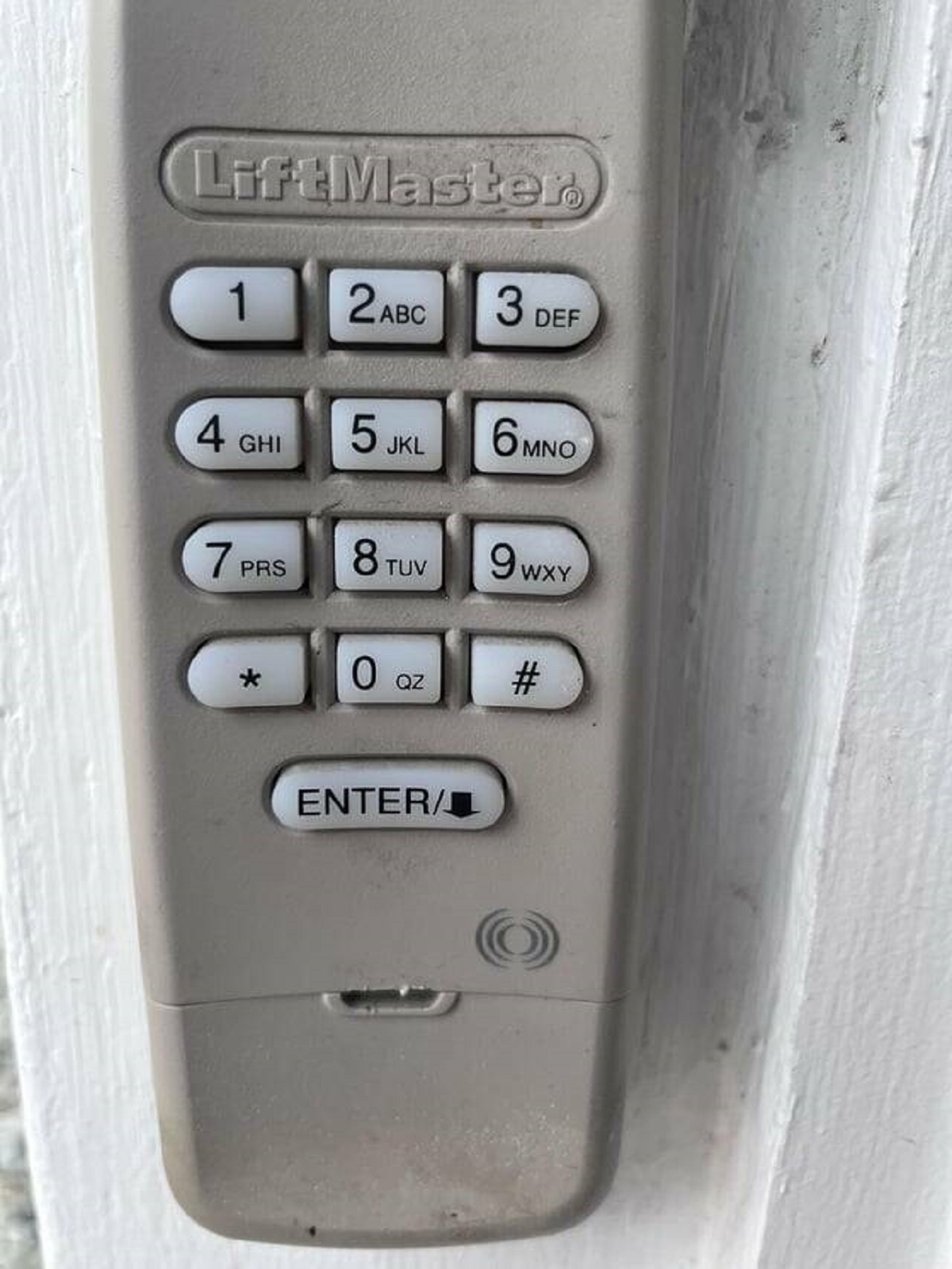 "The placement of the Q on our garage door opener."