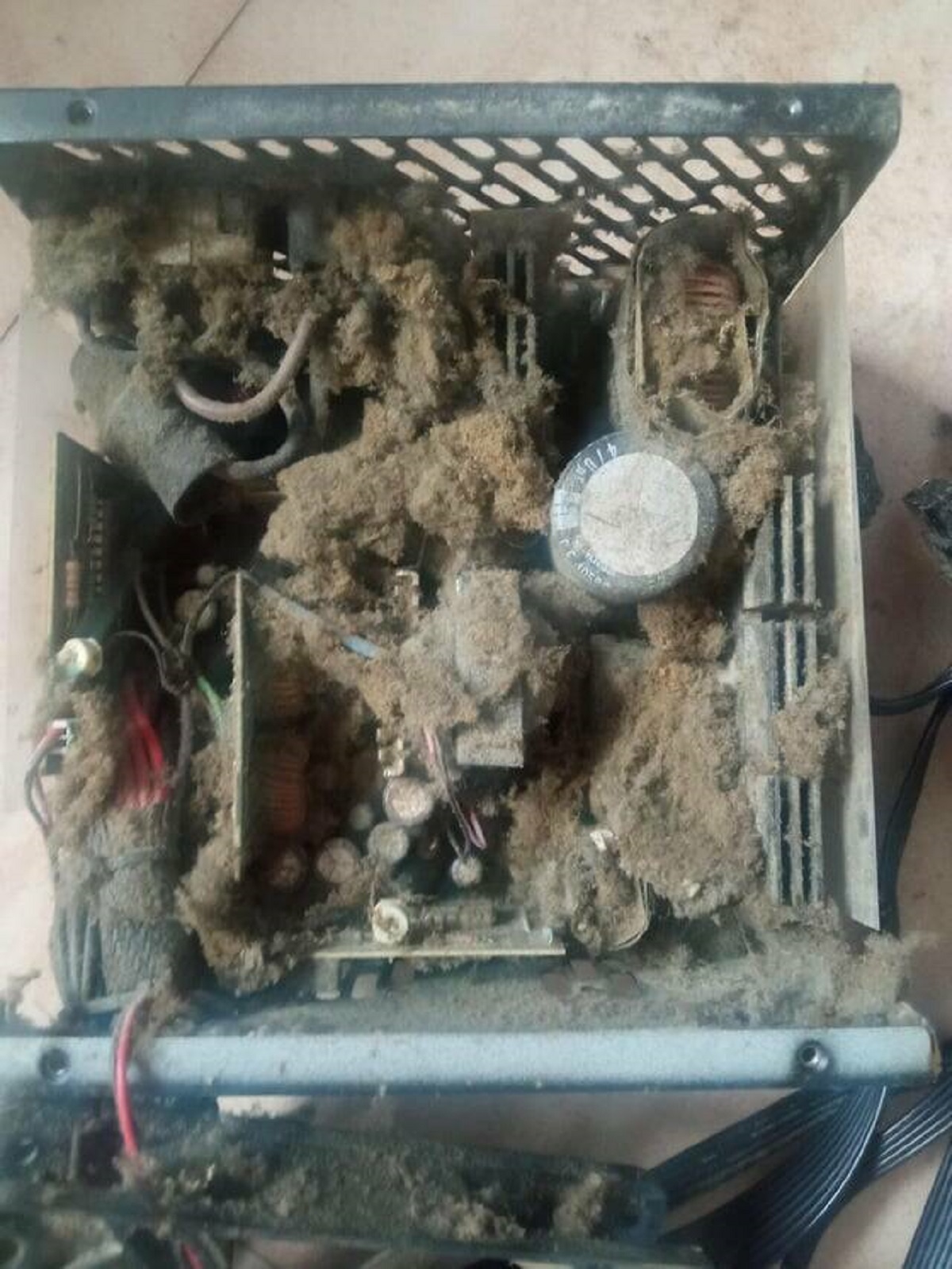 "My dusty PSU I couldn't clean for years because of breaking warranty sticker"