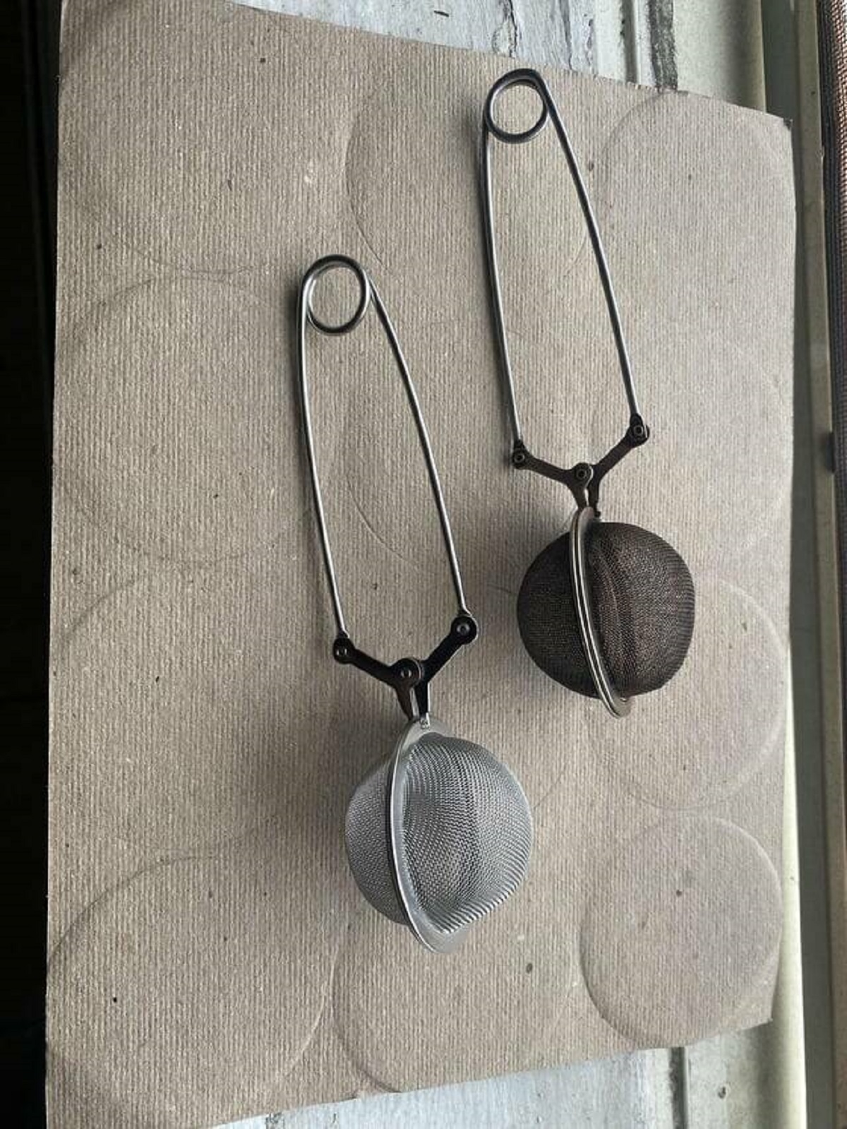 "The same tea ball: 15 years of use vs brand new replacement."