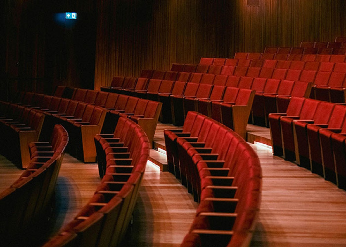 Theatre Seats aren’t all the same size. Some are narrower than others - we use a variety to manipulate the “sawtooth” arrangement so that you look through a gap between heads not straight into the head of the person in front of you. That means some seats are “better” (ie: wider) than others.
