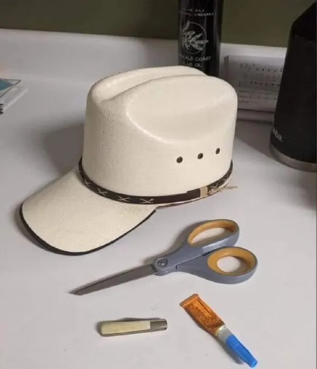 cowboy hat cut into baseball cap - Wald Const