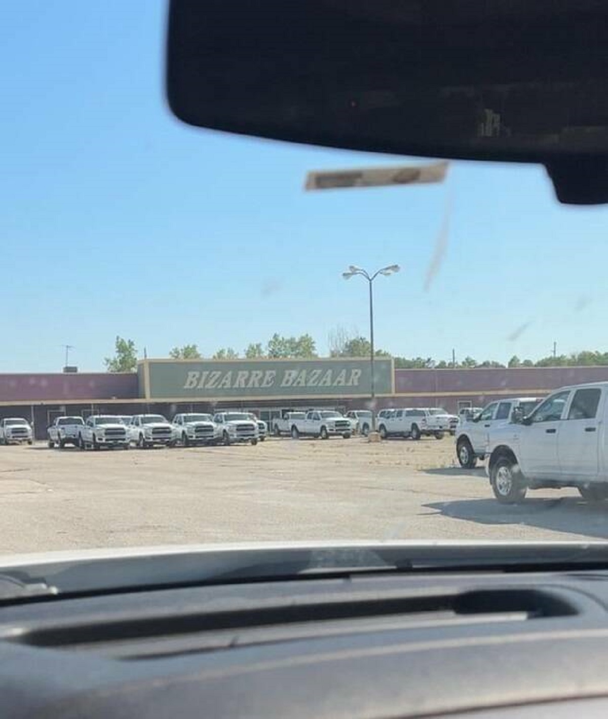 "Abandoned Parking lot with hundred of the exact same truck"