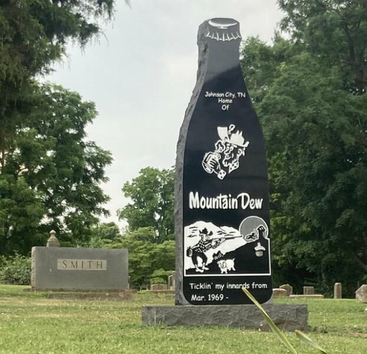 "My hometown erected a Mountain Dew tombstone in our local cemetery:"