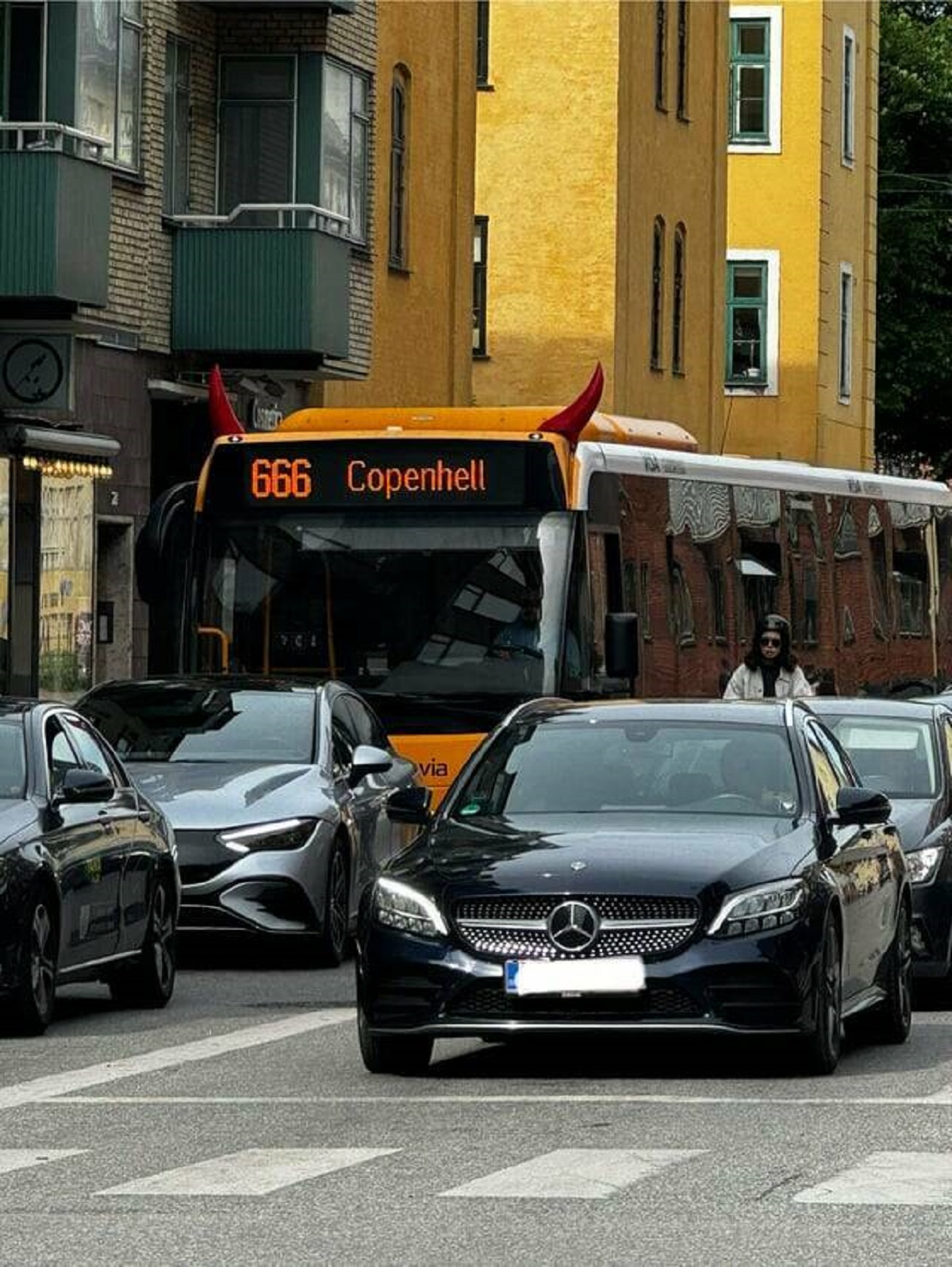"The buses going to Copenhagens biggest Rock/Metal festival have the number 666 (and horns)"