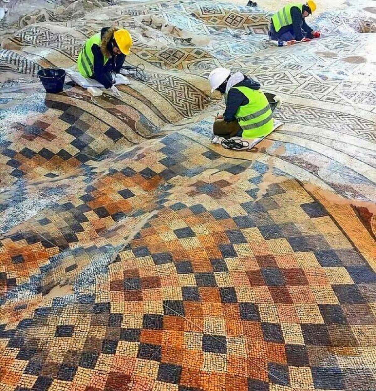 "One Of The Largest Roman Mosaic Floors Was Discovered During The Construction Of A Hotel In Antakya, Turkey. The Warping Effect Was Caused By The Earth Shifting Over Time And Earthquakes, Giving It The Impression Of A Giant Rippled Blanket"
