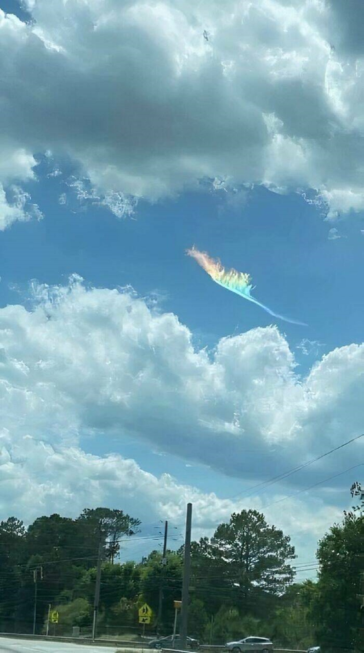 "This Very Rare Form Of Rainbow - Sometimes Called A Fire Rainbow - Is Caused By The Angle Of The Sunlight Hitting Cirrus Ice Crystals In The Atmosphere"