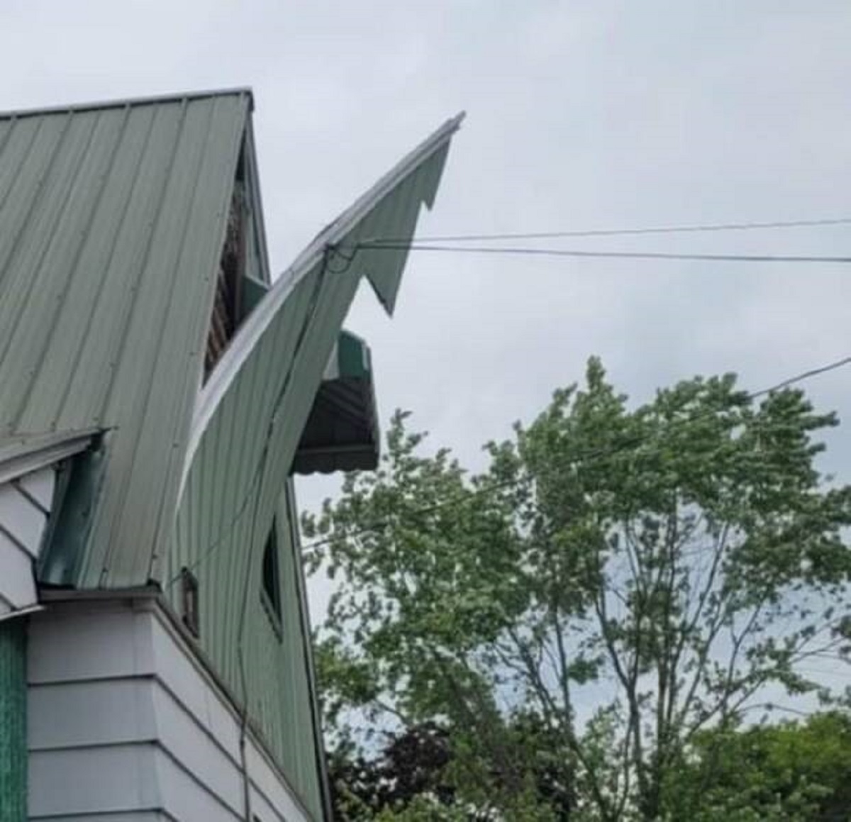 "Siding being peeled off my house"