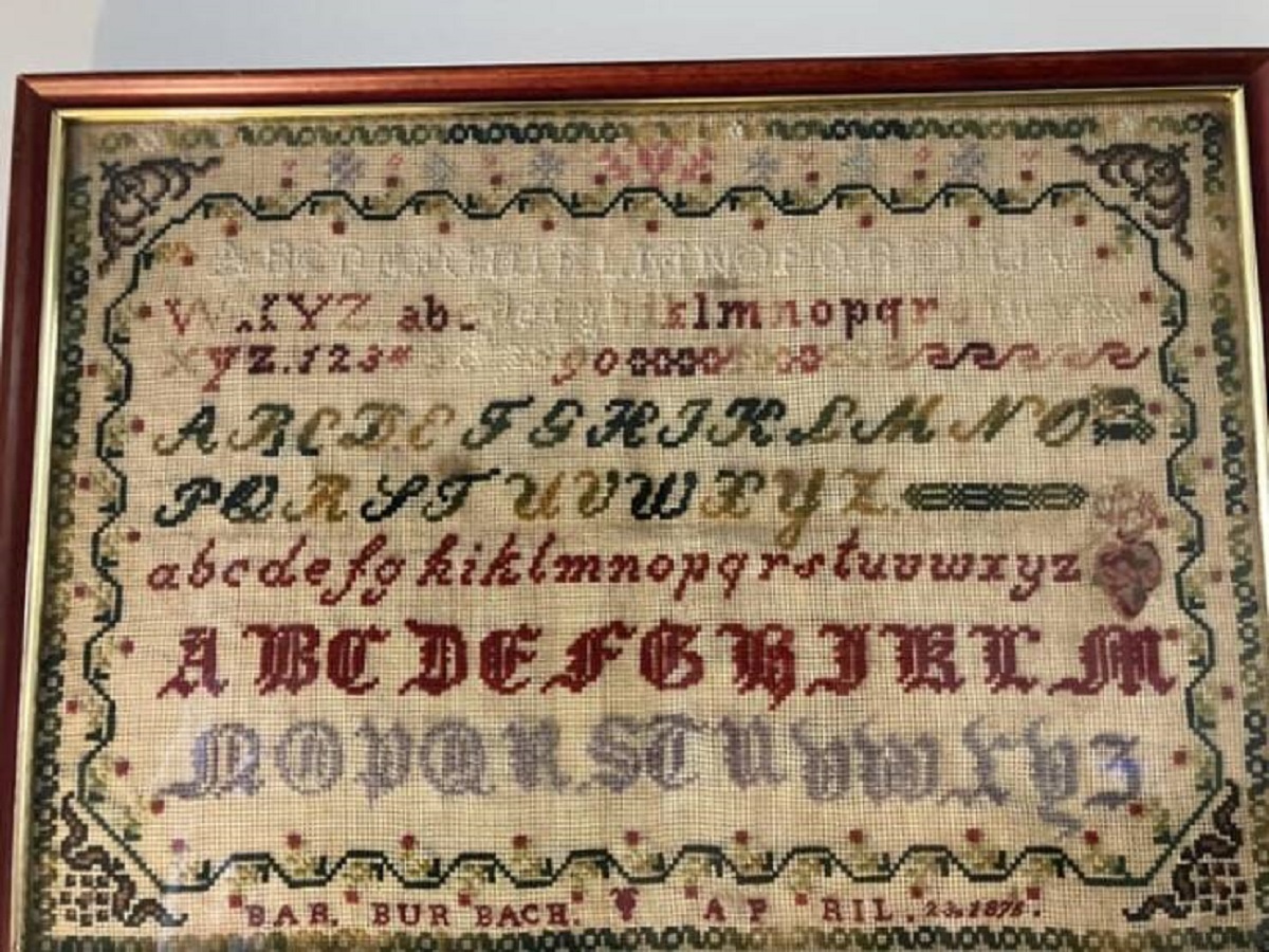 "My great grandmother’s cross stitch exercise is missing the letter J every single time"