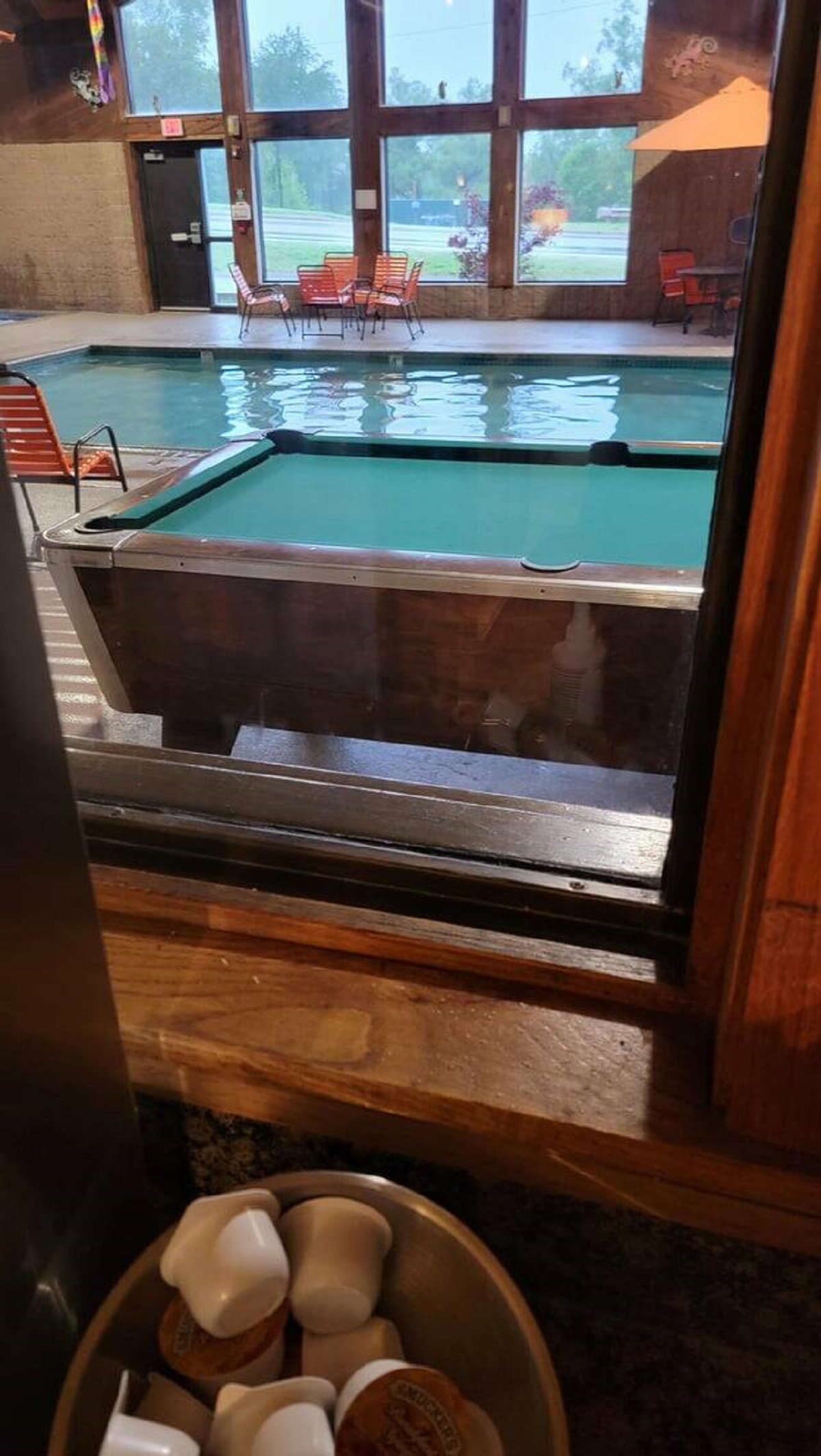 "Hotel I'm staying at has a pool table in the swimming pool room."
