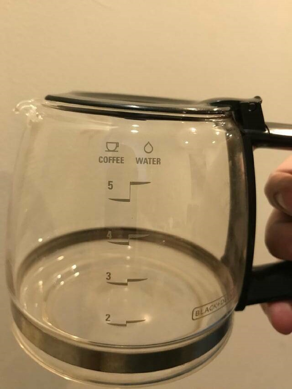 "Coffee pot shows different levels for water in vs coffee out"