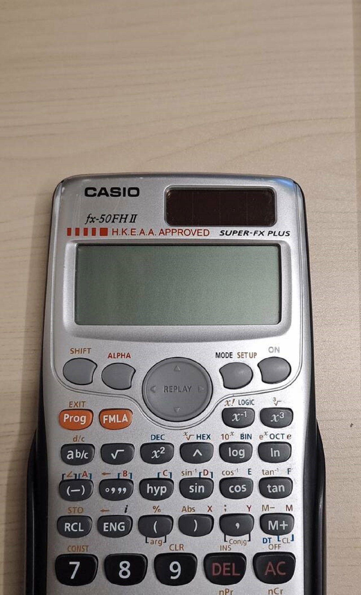 "In Hong Kong examinations, calculators are only allowed if they have this red little marking."