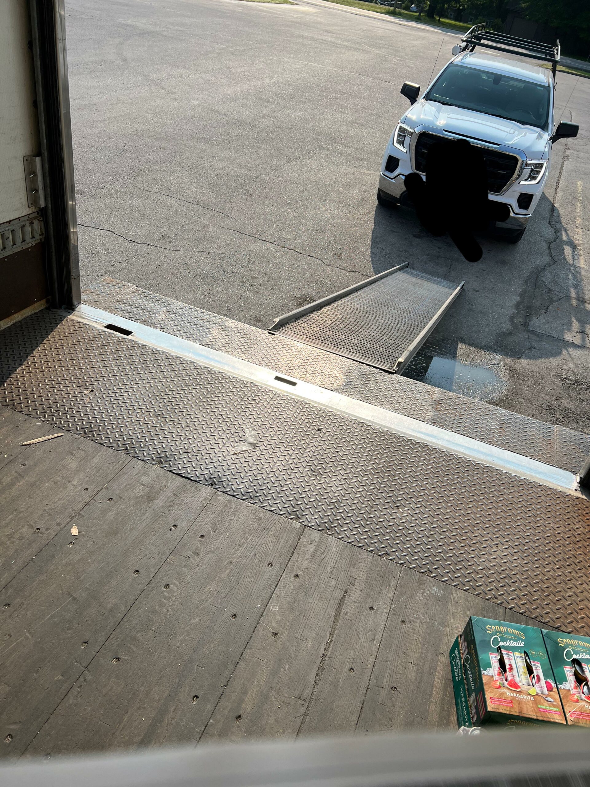This person who parked right behind a delivery truck’s loading ramp.