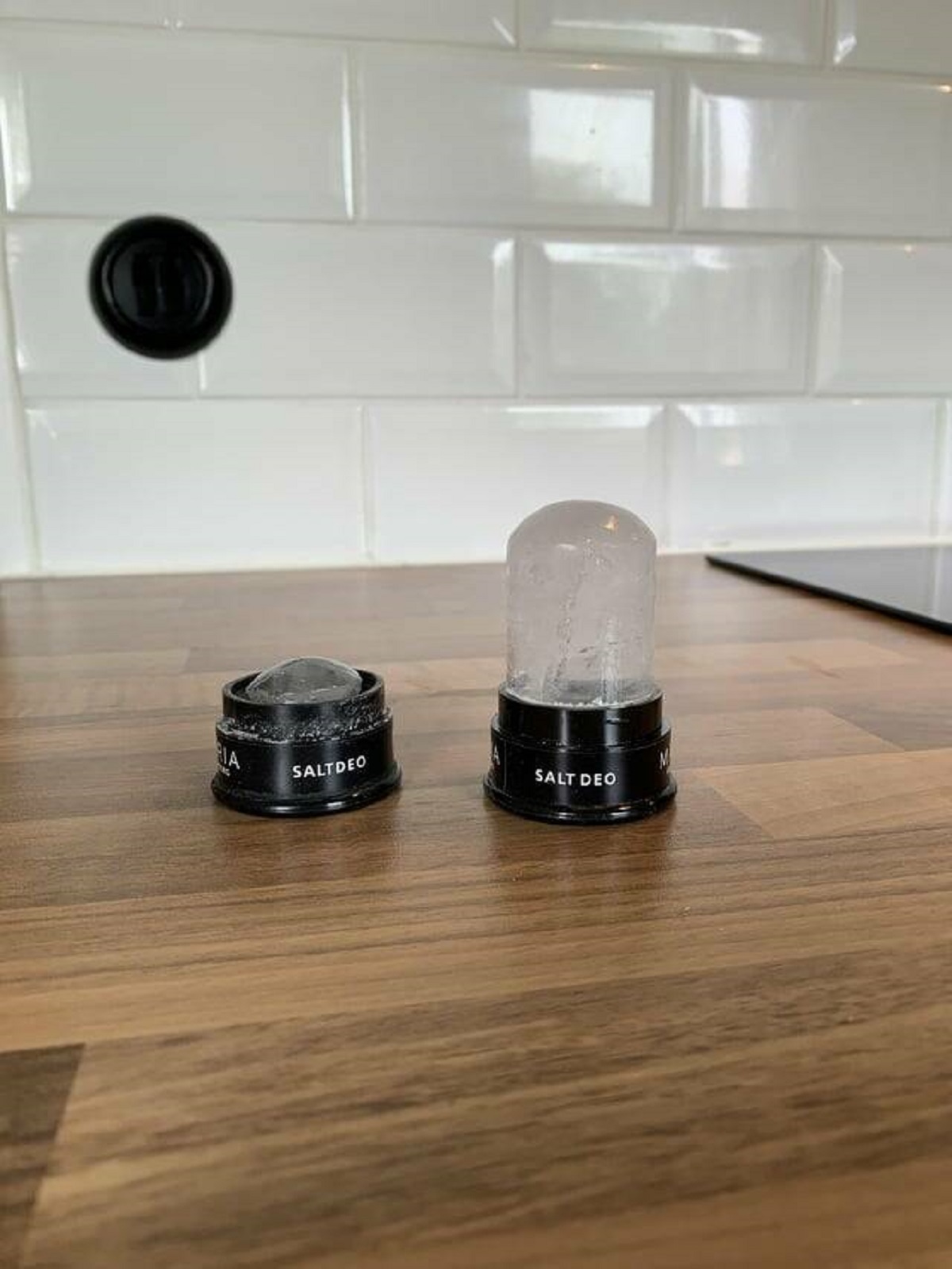 "My salt rock deodorant after five years of almost daily usage vs a new one."