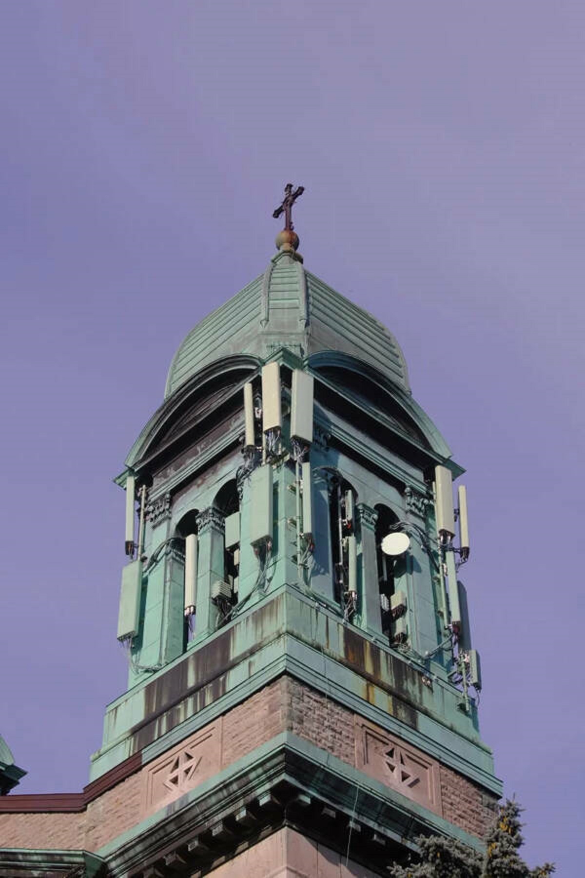 "This church spire has cellphone antennas camouflaged to look like copperoxide."