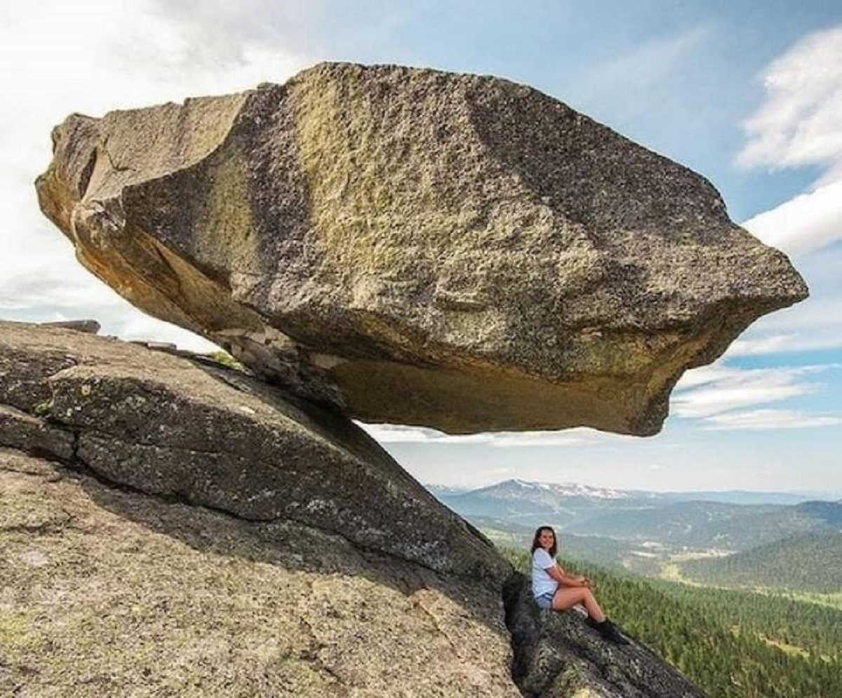 "An incredible hanging stone in the Sayan mountains of Siberia."