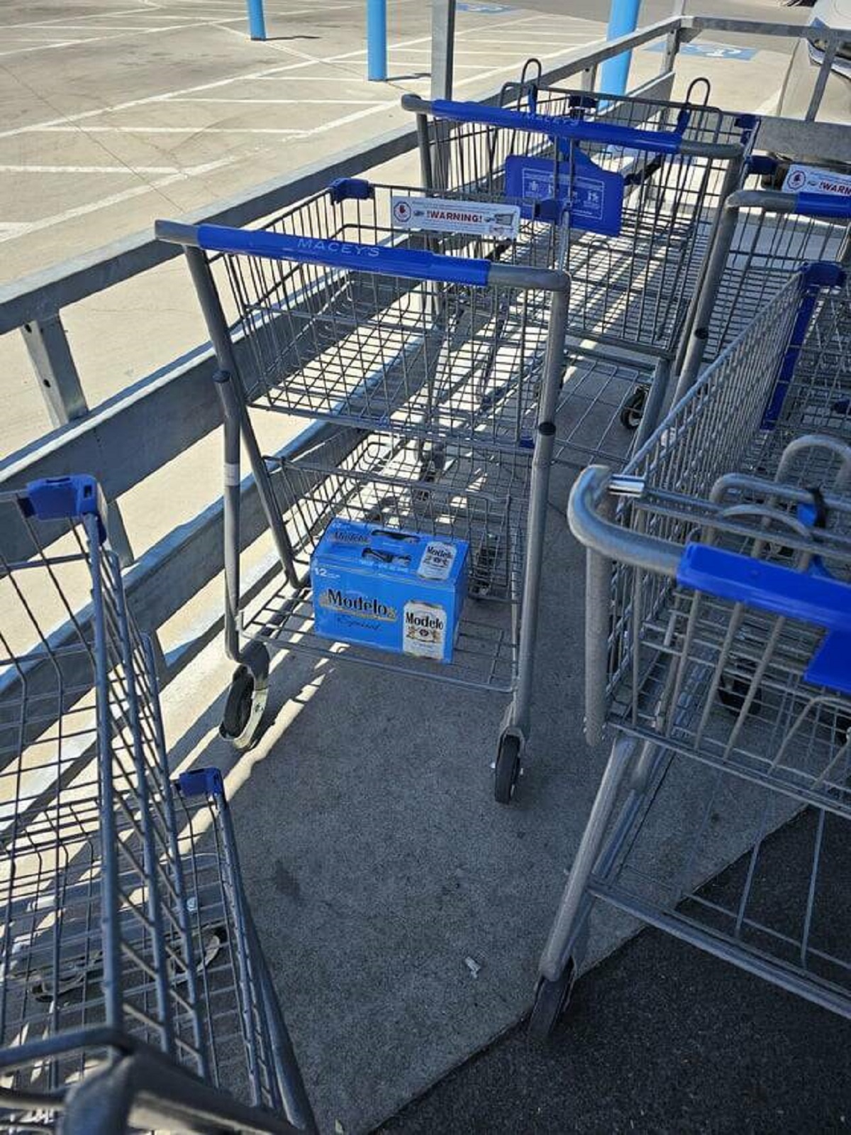 "Someone returned their grocery cart and forgot their beer."