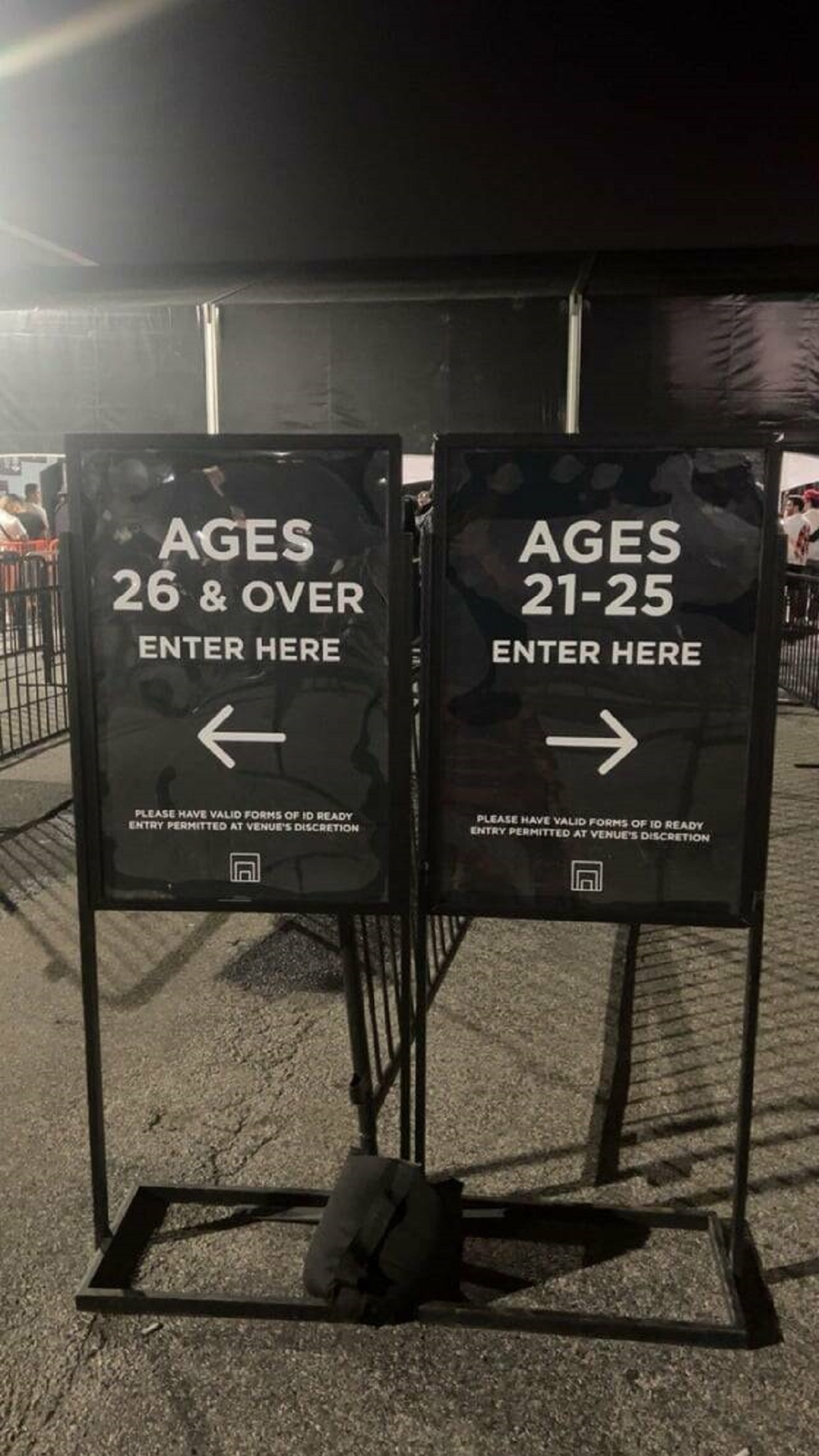 "Security line at a club in New York split into 21-25 and 26+"