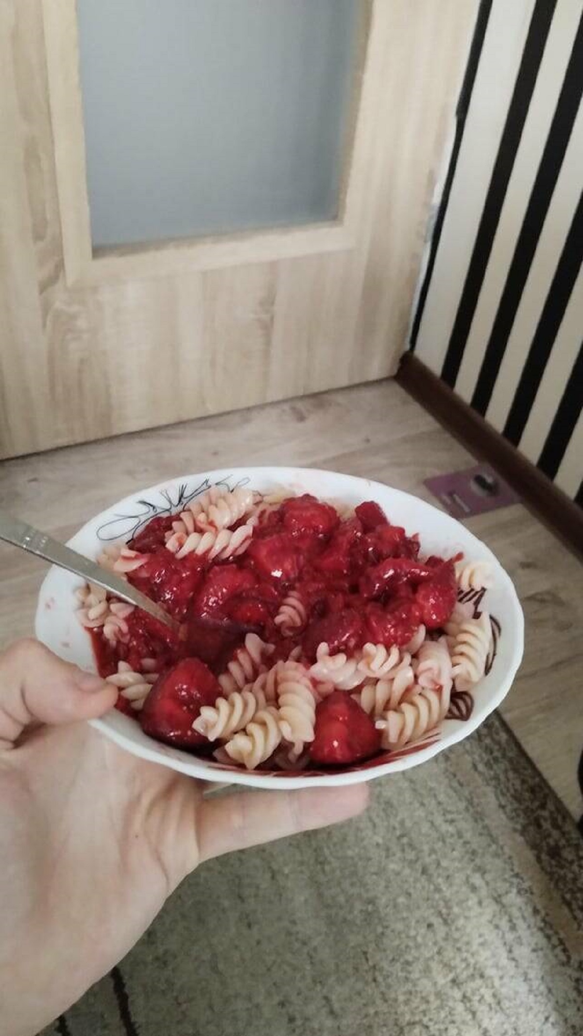 "Polish snack for hot days cold pasta with strawberries"