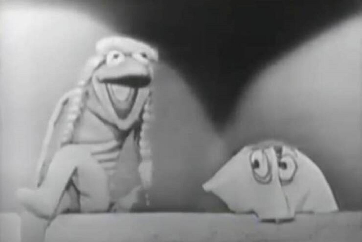 Before Kermit the Frog became famous as the leader of The Muppets, he was actually well-known for his drag act! He went by "Kermina" and performed a lipsync-comedy act to Rosemary Clooney's "I've Grown Accustomed to Your Face." Here's a screenshot of him performing it on The Steve Allen Show in 1956: