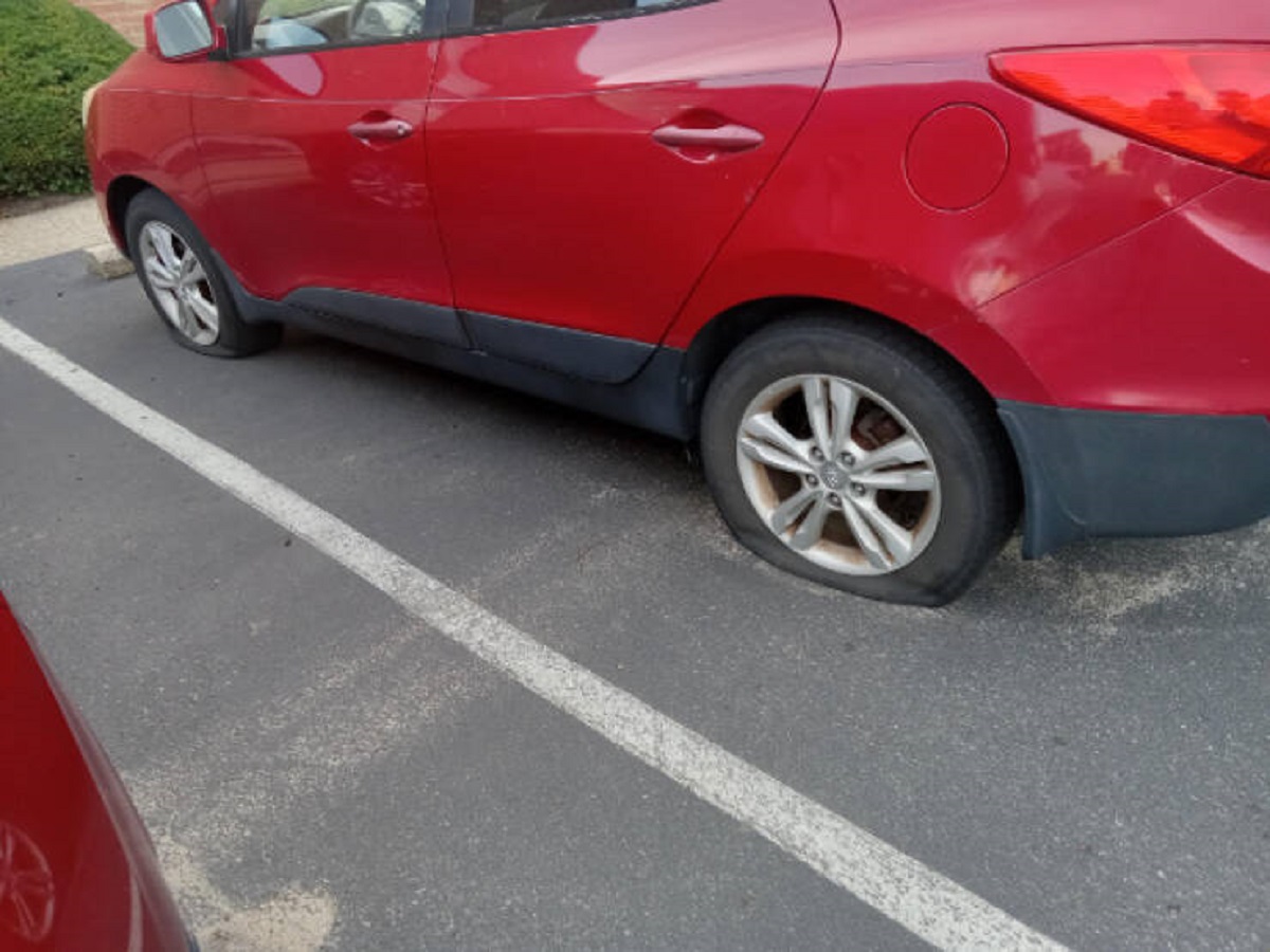 “Someone popped my front and back tire in my apartment parking lot over night. “