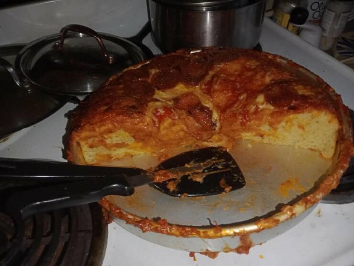 "Pizza....cake? lol. Forget the recipe said to divide the dough in half to make 2 pizzas."