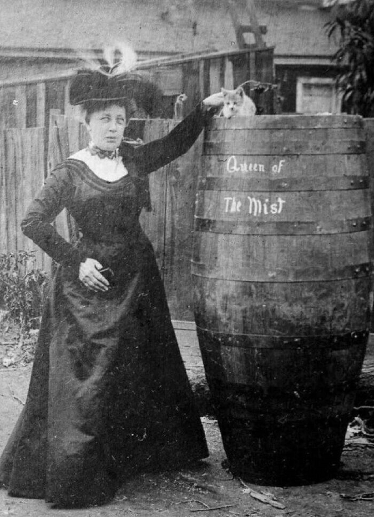 "Annie Edson Taylor And Her Cat, Pose With The Barrel She Went Over Niagara Falls In, 1901"