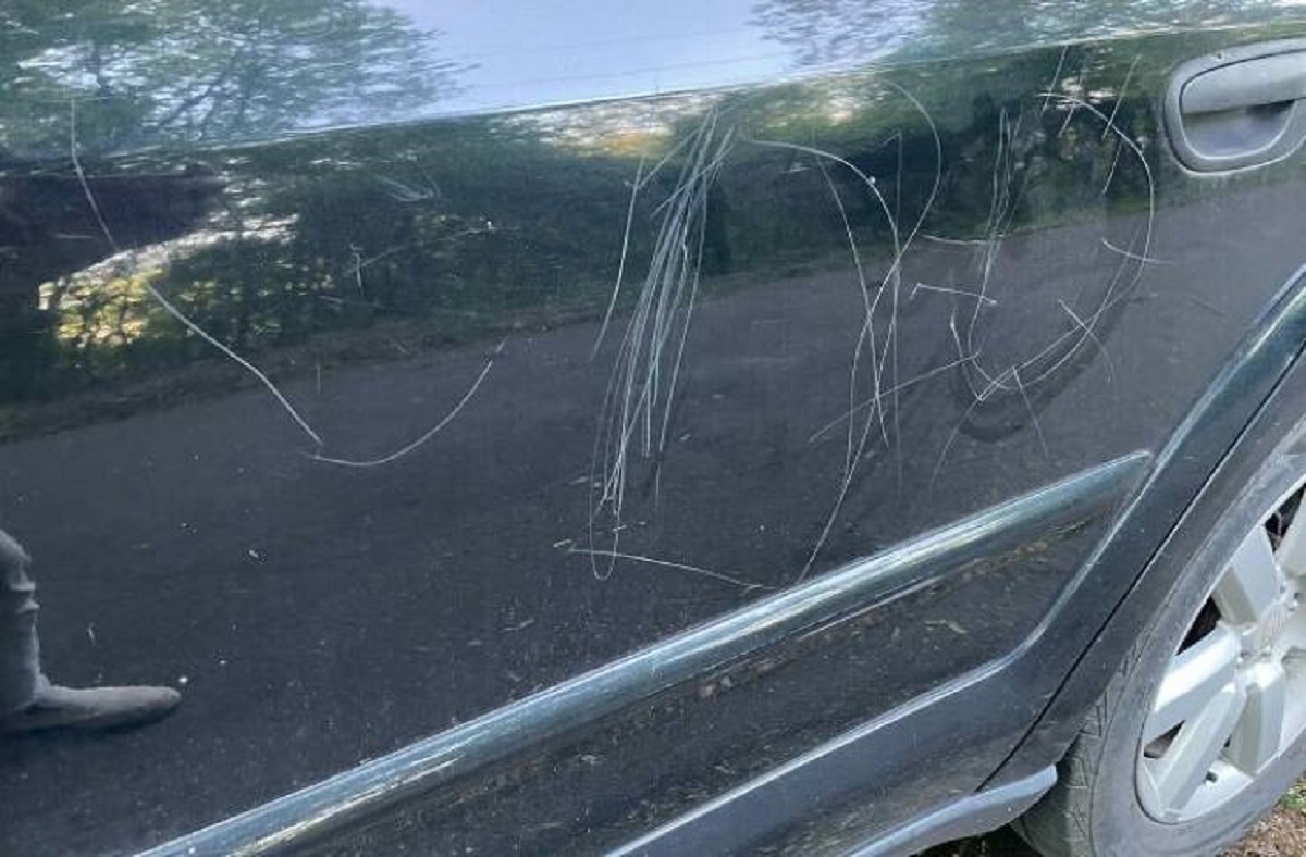 "Neighbor's Kid Decided To Decorate My Car With A Rock To Make It Look "Cute""