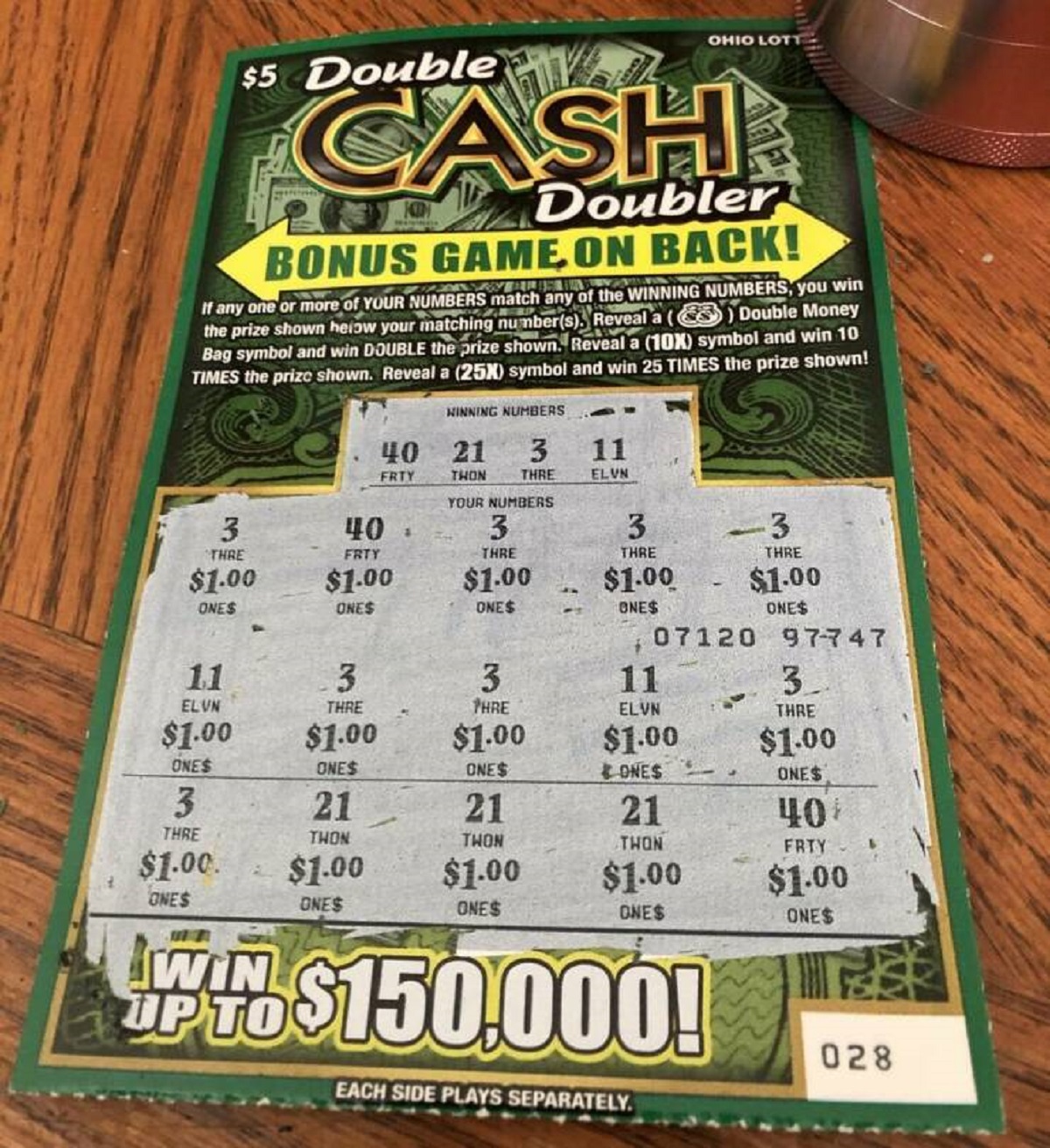 lottery ticket - $5 Double Cash Ohio Lot Doubler Bonus Game On Back! If any one or more of Your Numbers match any of the Winning Numbers, you win the prize shown herow your matching numbers, Reveal a Double Money Bag symbol and win Double the prize shown 