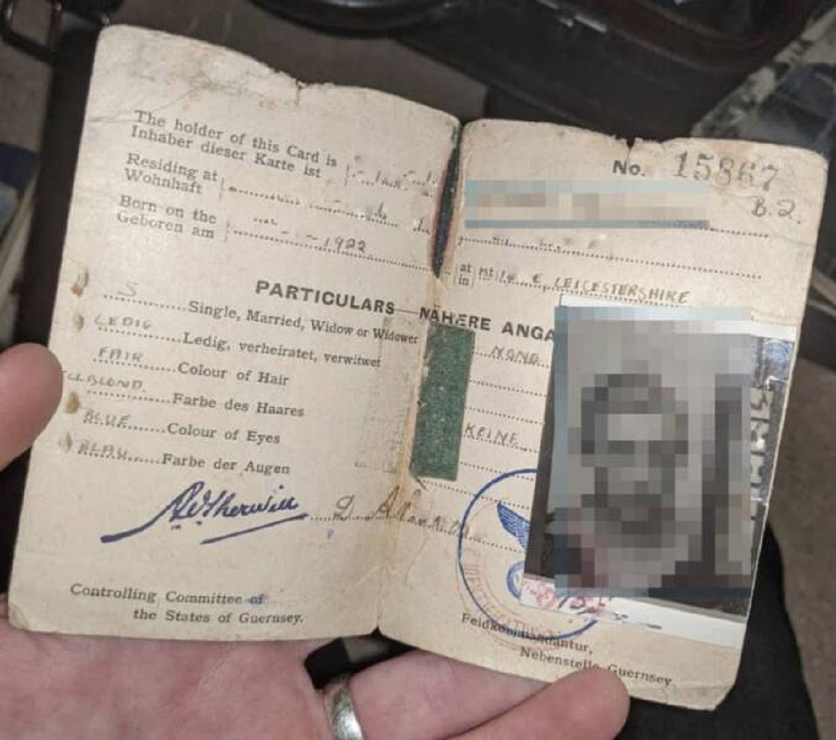 Here's an identity card from a war prisoner in Normandy during WWII.