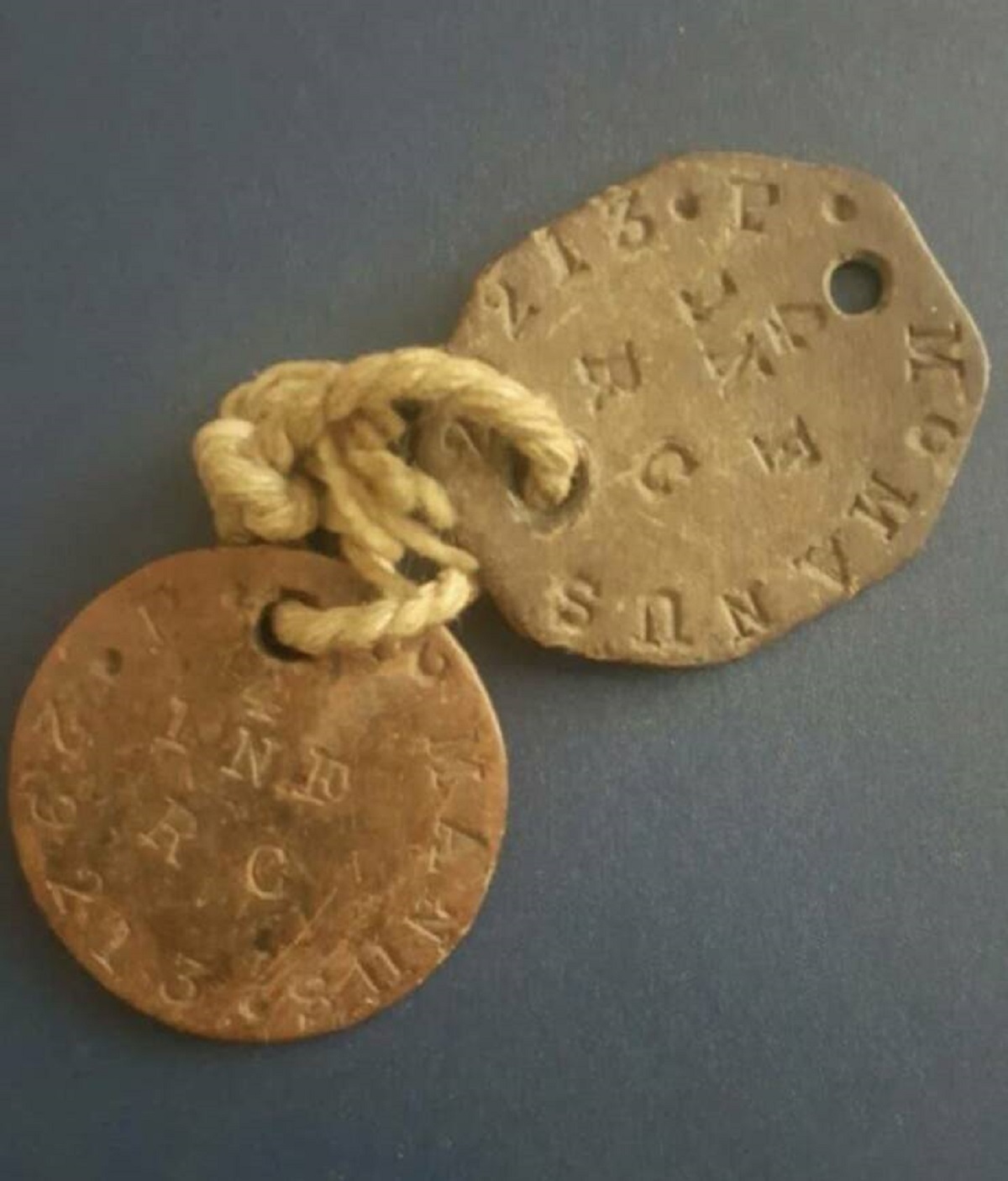 And finally, did you know some dog tags from WWI were made of asbestos? Here's what they looked like.