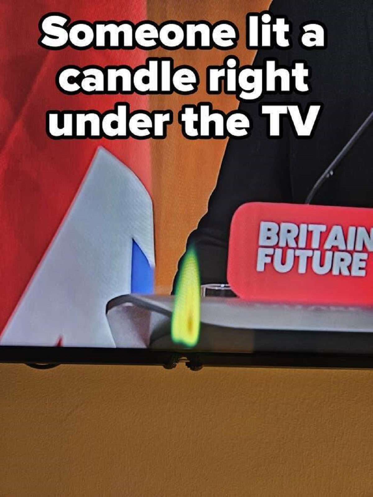 photo caption - Someone lit a candle right under the Tv Britain Future