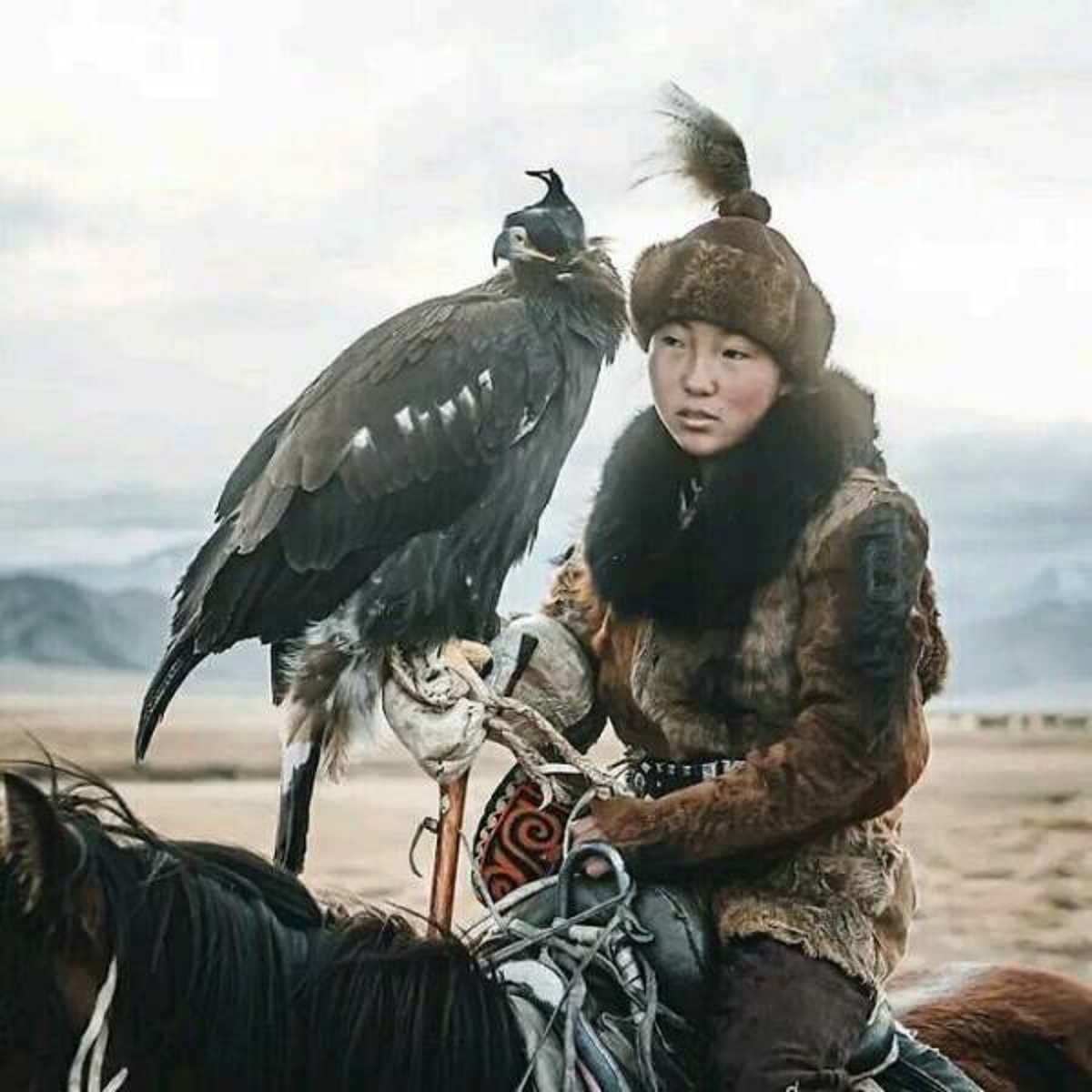 "Mongolian Huntress With Her Eagle"