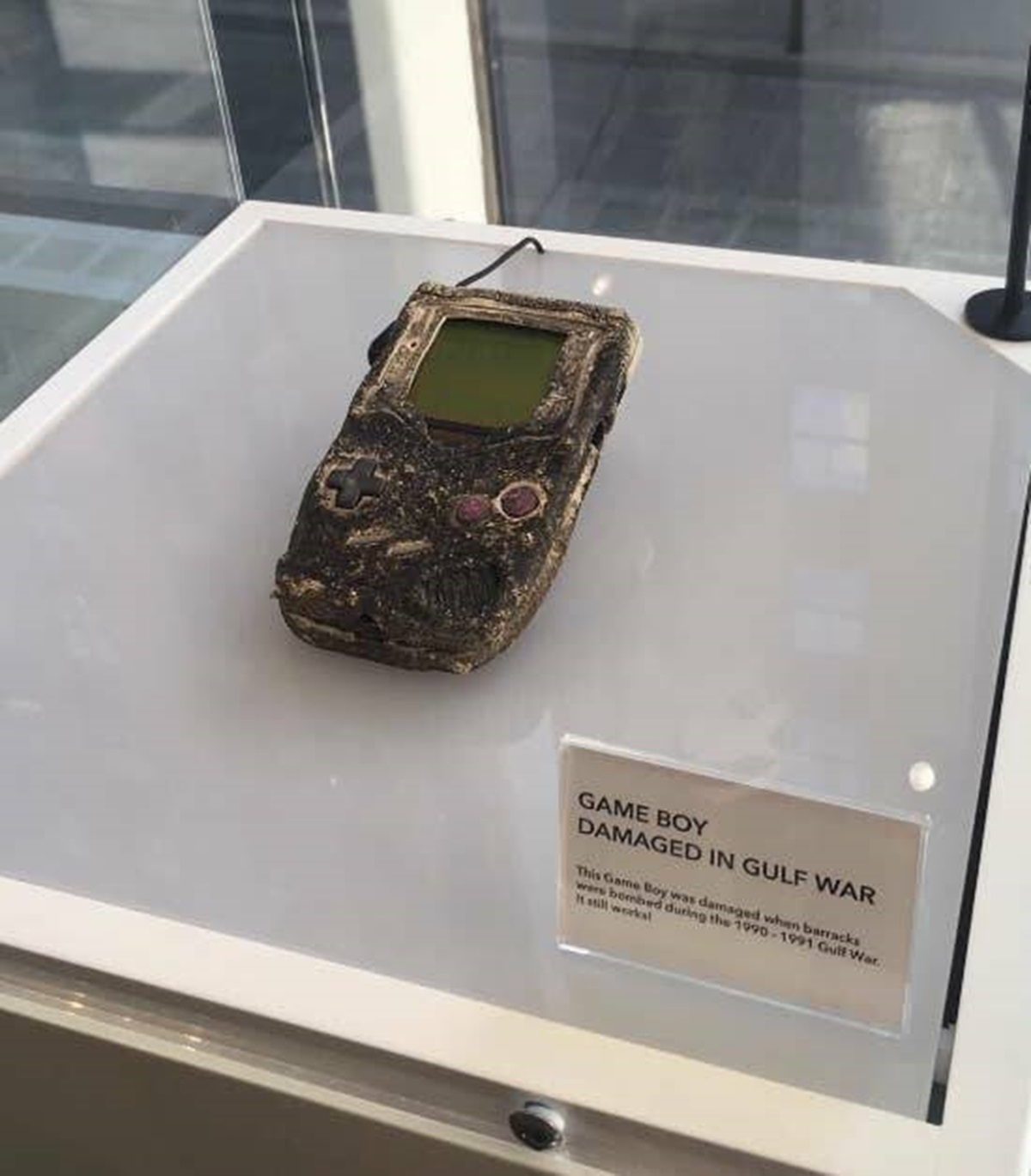 gameboy durable - Game Boy Damaged In Gulf War This Game Boy was damaged when barracks wers bombed during the 19901991 Gulf War. It still workal