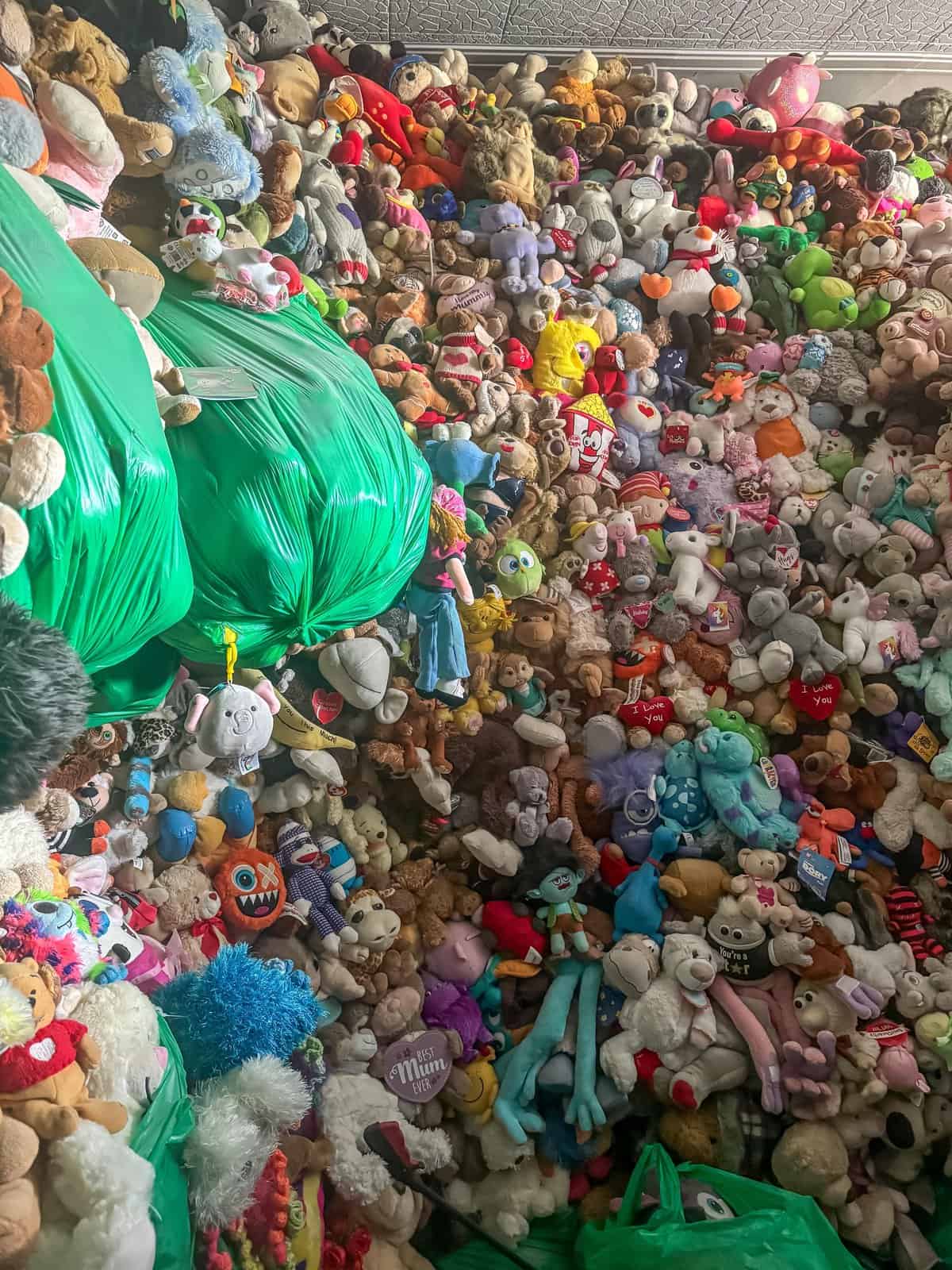 Abandoned house filled with thousands of soft toys. The lady was a hoarder who died in 2021 with no family. Insane place, literally falling on your head walking through. Every room was stacked.